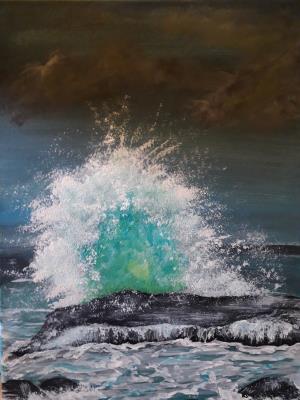Breaking wave on rocks