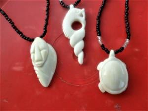Spirit Guardian & Nyaminyami Pendants in Bone - Lawrence Mzimba: Zimbabwe